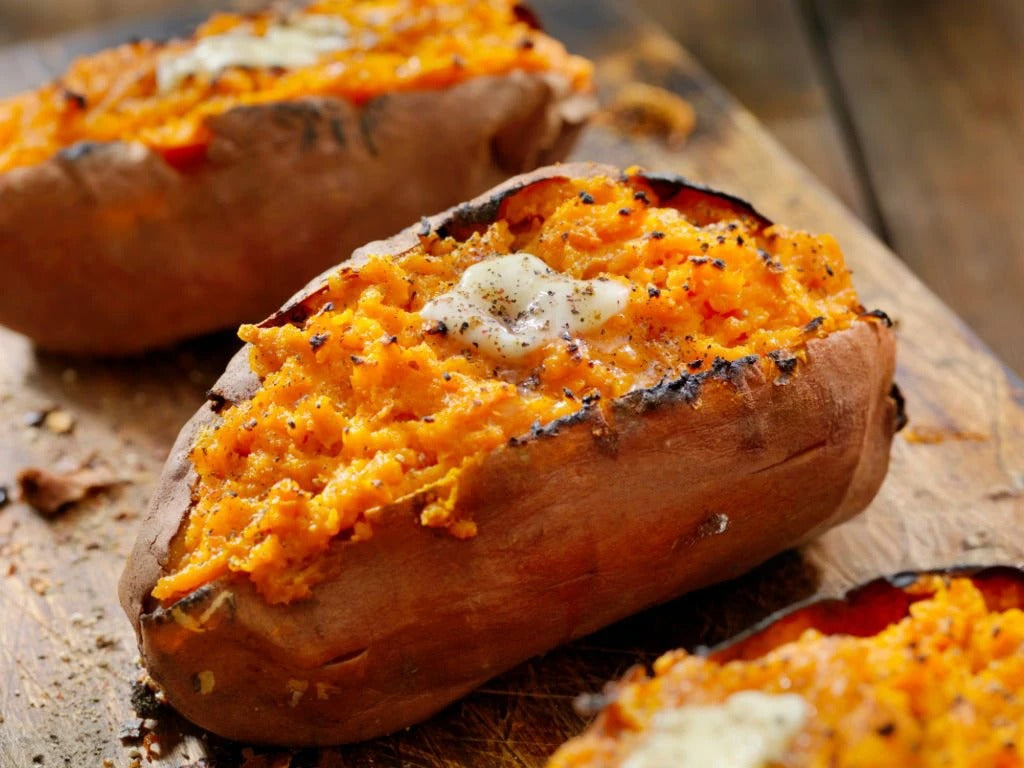 Twice Baked Stuffed Sweet Potatoes with Melting Butter and Cracked Pepper