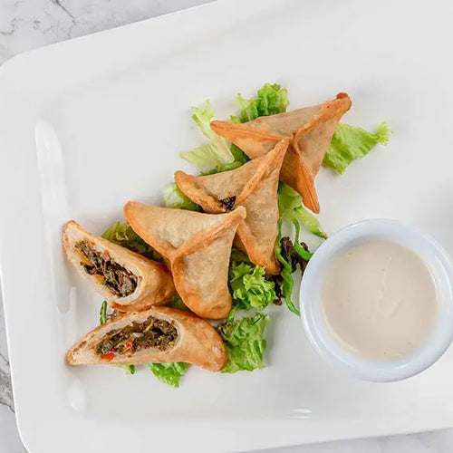 Fried Spinach Sambusek Lemon