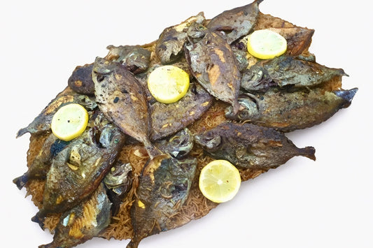 Fried Safi Fish with eggplant hamsa and shalani rice